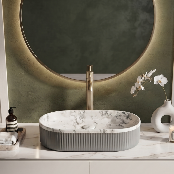 Premium oval table top wash basin with white marble finish interior and grey ribbed exterior, 600 x 340 x 130 mm, modern countertop bathroom basin