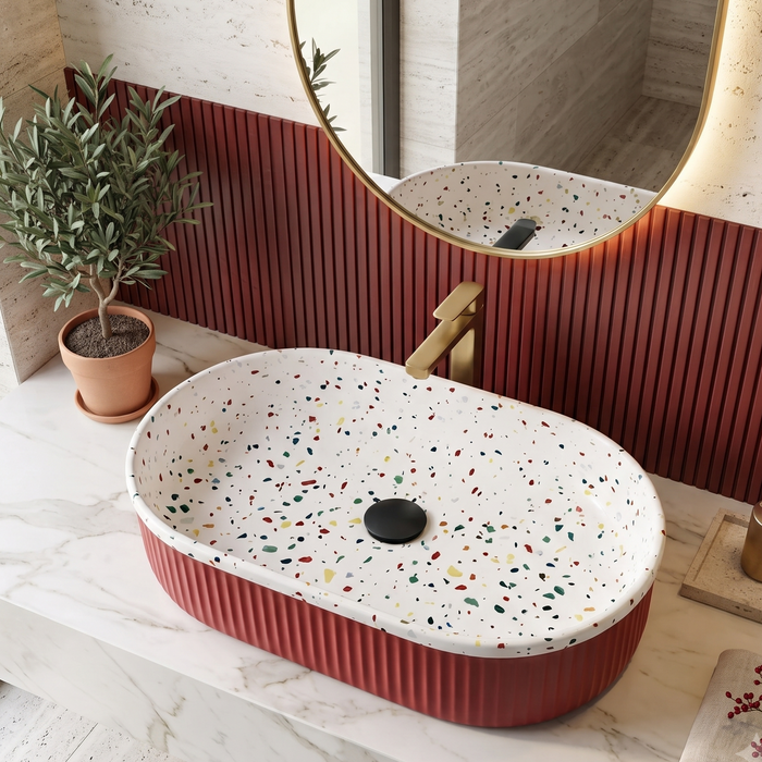 Red ribbed ceramic oval table top wash basin with white multicolour terrazzo finish interior, 600 x 340 x 130 mm, modern countertop bathroom basin