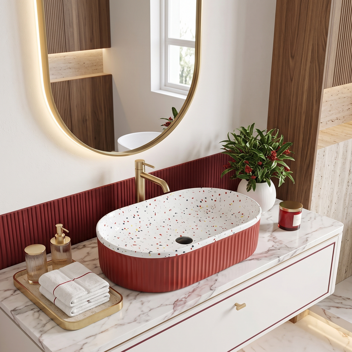 Red ribbed ceramic oval table top wash basin with white multicolour terrazzo finish interior, 600 x 340 x 130 mm, modern countertop bathroom basin