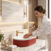 Red ribbed ceramic oval table top wash basin with white multicolour terrazzo finish interior, 600 x 340 x 130 mm, modern countertop bathroom basin