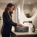 Smoky grey round glass table top wash basin with vertical ribbed design, 400 × 400 × 120 mm, for modern luxury bathrooms.