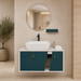 Teal and white wall-mounted bathroom vanity set with a rectangular vessel basin, round mirror, matching shelf and gold cabinet handles.