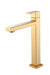 Gold faucet on a white background