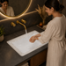 White and gold designer ceramic under counter wash basin with glossy finish, 520 × 380 × 190 mm rectangular undermount bathroom basin with decorative gold pattern.