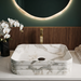 White and grey marble pattern ceramic rectangular table top wash basin 460x325x125 mm with rounded corners and horizontal ribbed exterior.