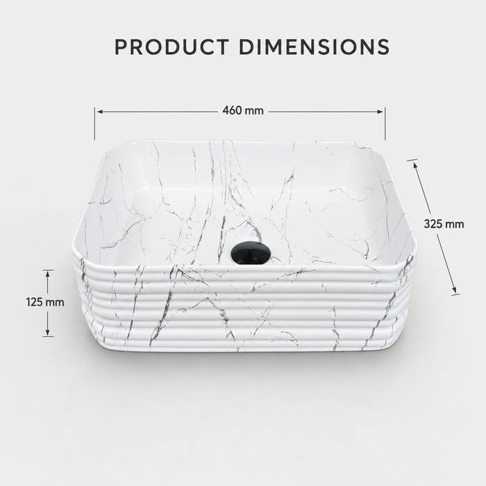 White marble ceramic rectangular table top wash basin, 460x325x125 mm, with rounded corners and horizontal ribbed design for modern bathrooms.