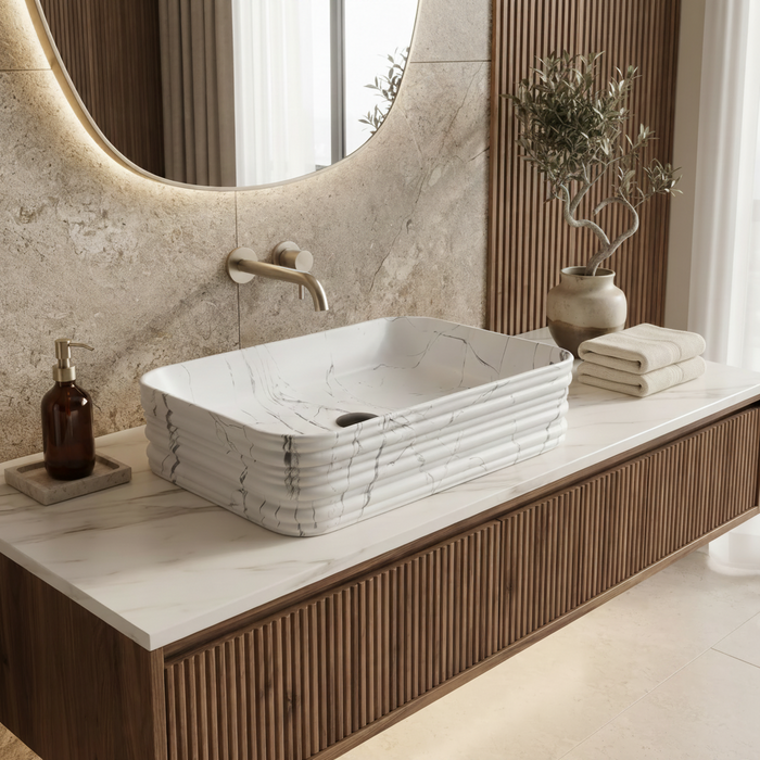 White marble ceramic rectangular table top wash basin, 460x325x125 mm, with rounded corners and horizontal ribbed design for modern bathrooms.