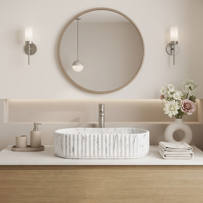 White marble fluted ceramic table top wash basin, 510x310x120 mm, with oval oblong shape and ribbed exterior for modern bathrooms.