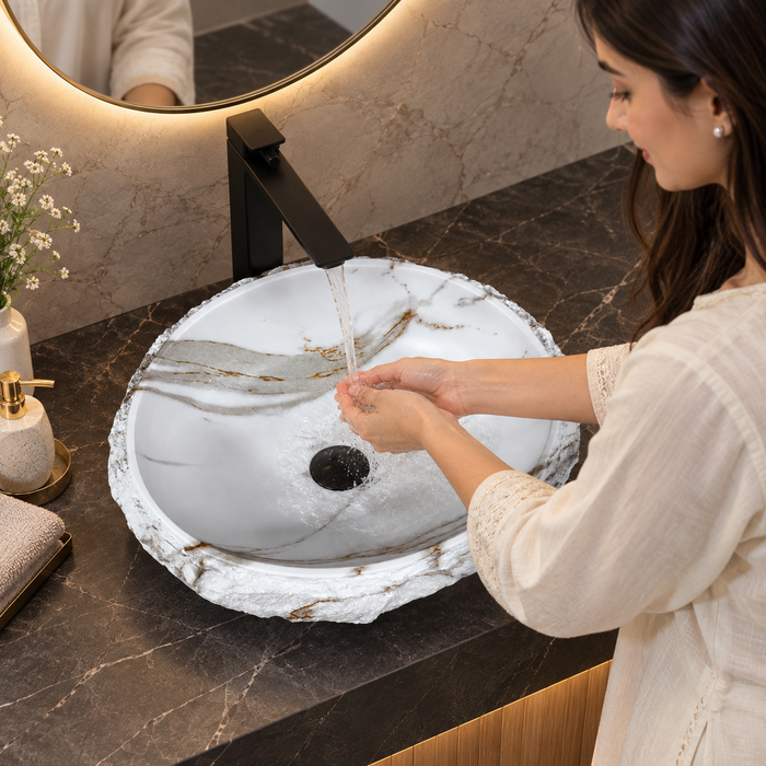 White oval table top wash basin 480 × 390 × 150 mm with natural stone-inspired textured exterior and subtle marble veining for modern luxury bathrooms.