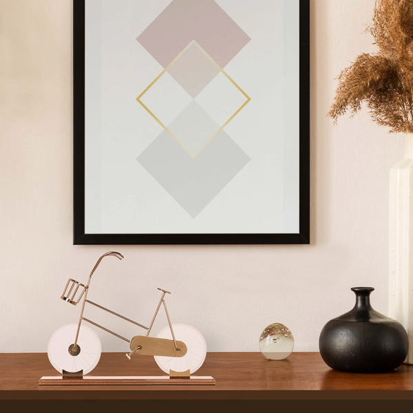 Featuring a delicate bicycle design crafted with gleaming gold accents and transparent glass elements creates a dynamic visual effect, making it a perfect statement piece for modern, eclectic, or minimalist interiors. BSP-8130